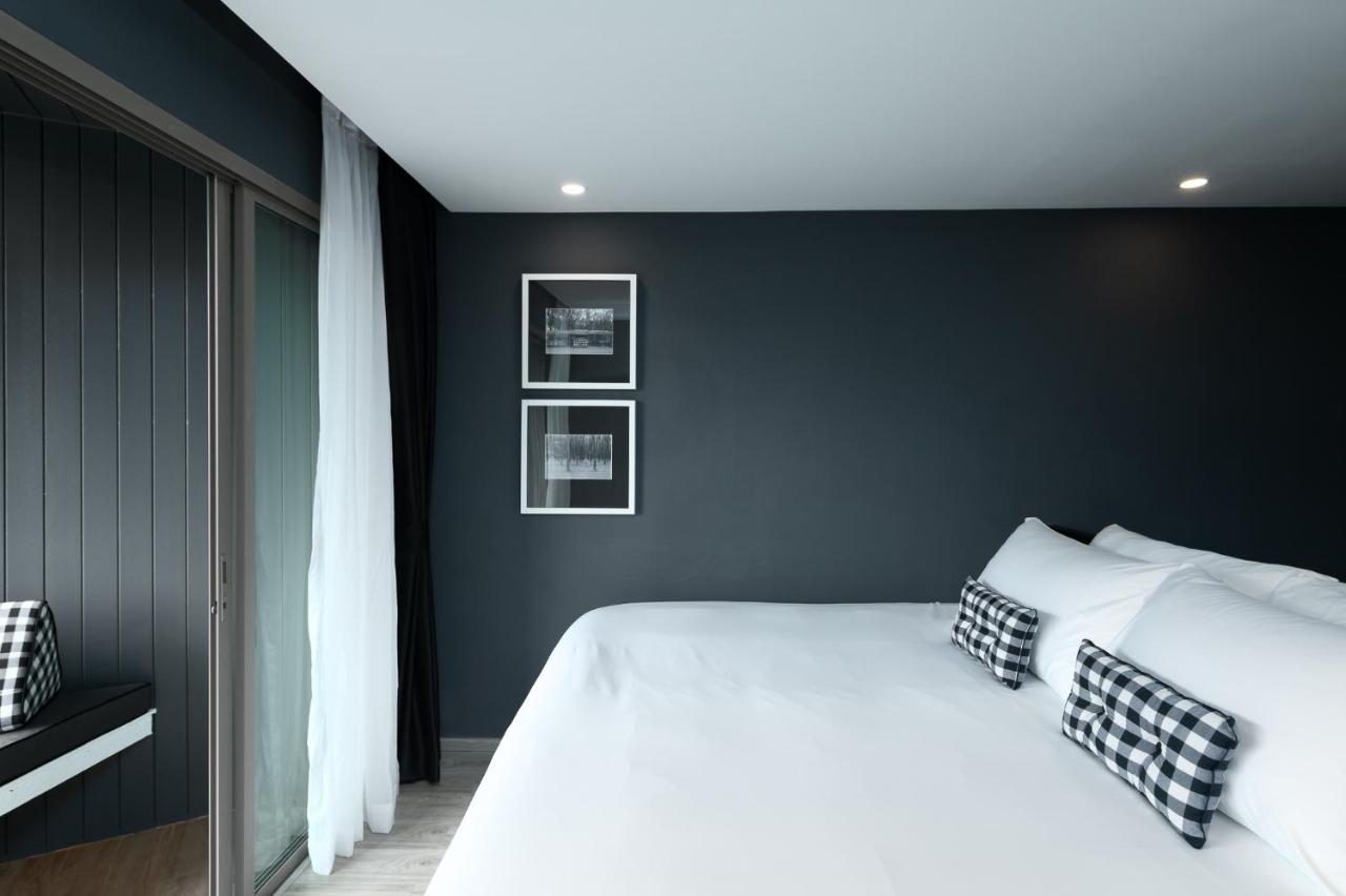 Foto Hotel Phuket Beachfront Dış mekan fotoğraf A bedroom